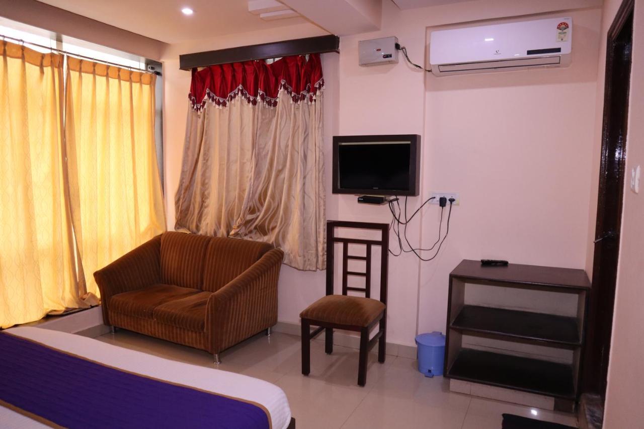 Smilestay Bns Lodge Bangalore Bagian luar foto