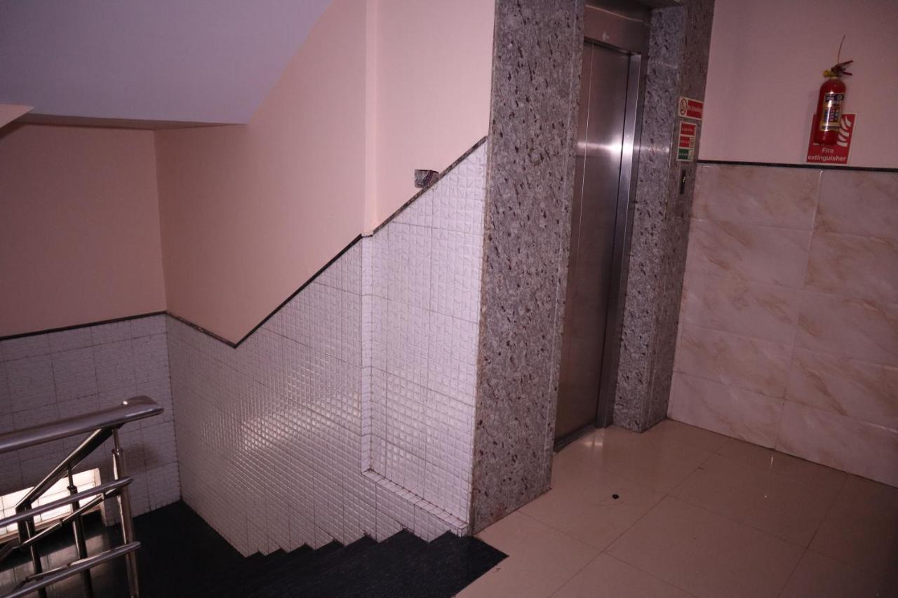 Smilestay Bns Lodge Bangalore Bagian luar foto