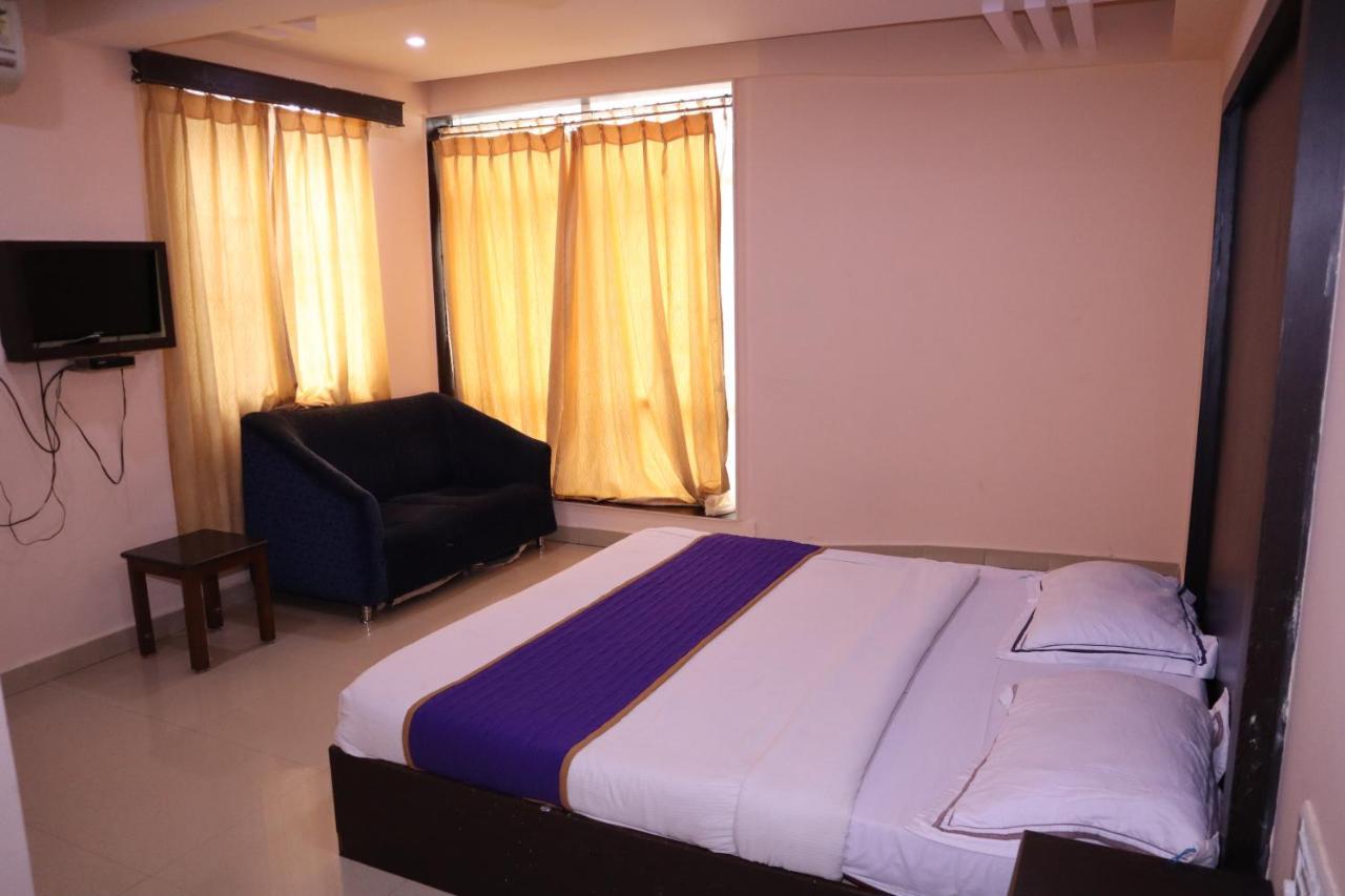Smilestay Bns Lodge Bangalore Bagian luar foto