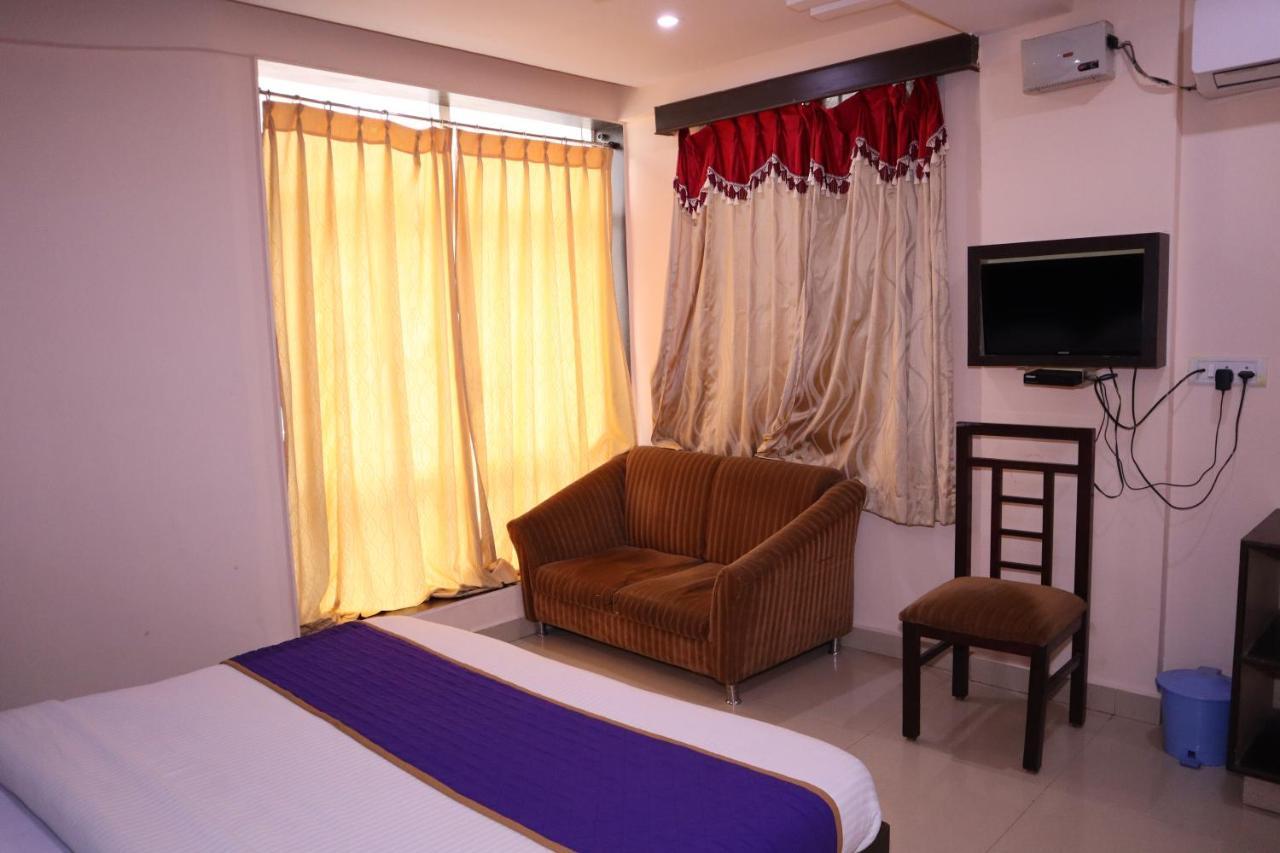Smilestay Bns Lodge Bangalore Bagian luar foto