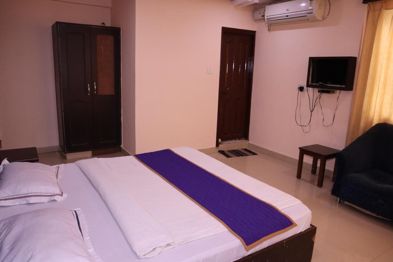 Smilestay Bns Lodge Bangalore Bagian luar foto