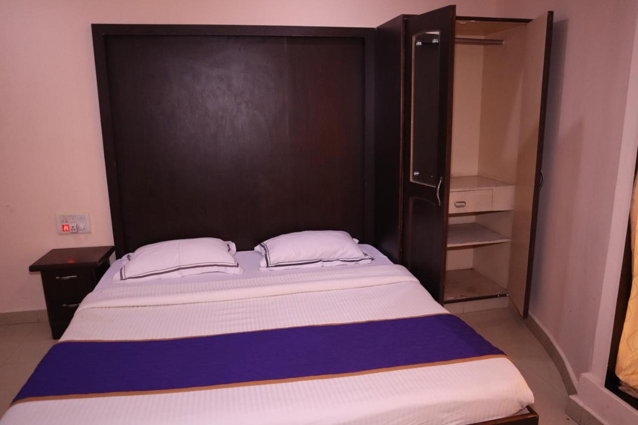 Smilestay Bns Lodge Bangalore Bagian luar foto