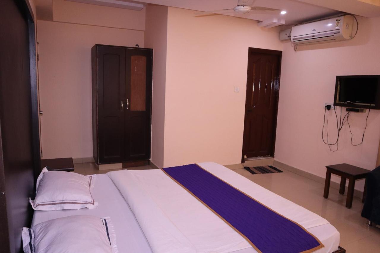 Smilestay Bns Lodge Bangalore Bagian luar foto
